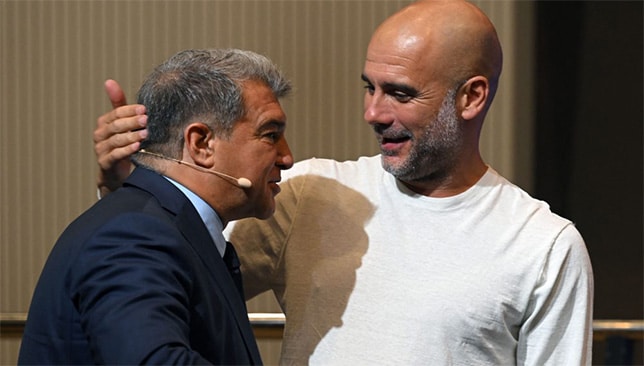 Pep Guardiola et Joan Laporta (Getty)